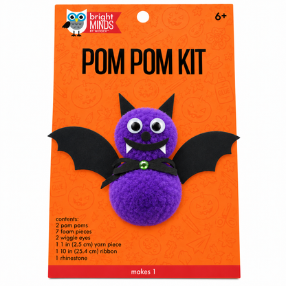 Bright Minds by Melissa Pom Pom Kit featuring a purple pom-pom bat with black wings and a black sash, displayed on its orange retail backing card.